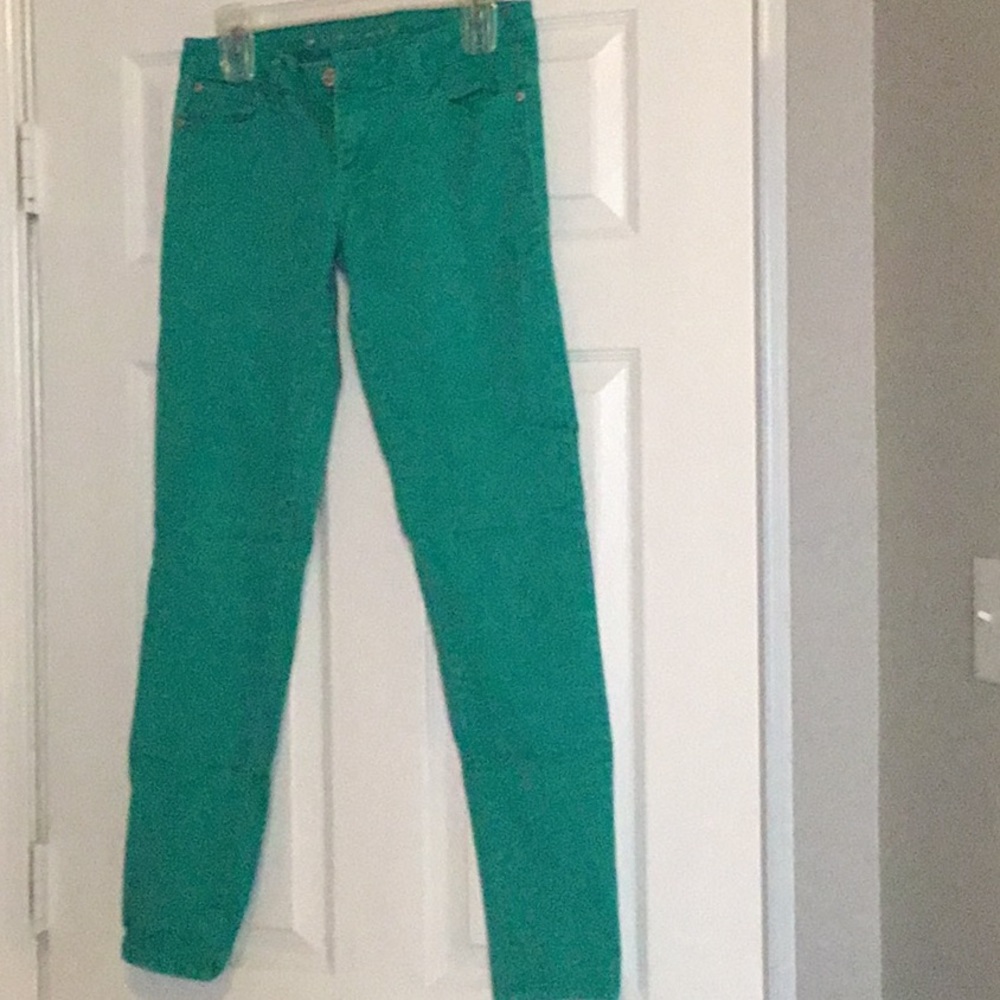 Green, skinny jean
